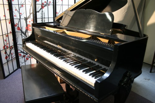 Art Case Ebony Gloss Sterling Baby Grand Piano $4500.